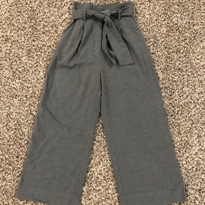 H&M grey wide leg, high waist trousers.
